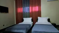 Deluxe Twin Beds in Royal Blue Guest House and Bar Hotels in Lome