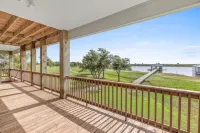 REEL N REST in Hackberry LA ! Waterfront home with beautiful views .