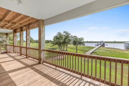 REEL N  REST in Hackberry LA ! Waterfront home with beautiful views .