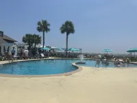 Experience Island Bliss in this perfectly located Beach Club Villa!