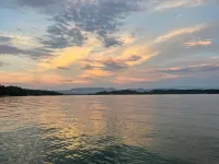 "LAKE HOUSE" On 7 Acres Of Douglas Lake With A Private Boat Ramp & Private Dock!