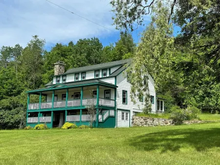 Mountain View Loj overlooking the majestic Adirondack Mountains & Ausable River