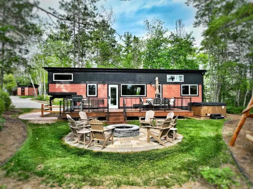 Near Pictured Rocks and trails, on the AuTrain River, has private hot tub