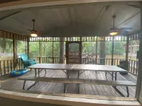 Two Story House with Deck over the River