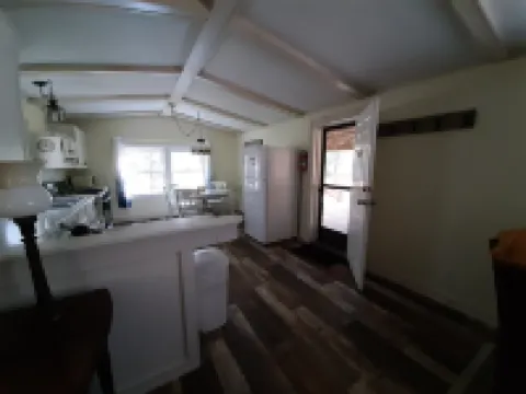 Cozy nestled in quiet neighborhood. On snowmobile and ATV trail.