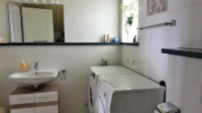 Vacation apartment with a panoramic view, modern, by a golf course, wellness 拉姆酒店