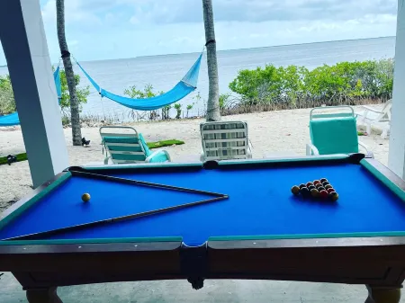 Oceanfront Gated Corner lot Amazing Sunsets. 90” BoatDock & 12 person Swim Spa!