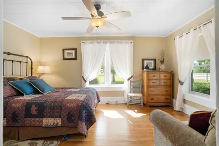 Historic Early Settler Farm House that Has Been Modernized For Your Comfort.