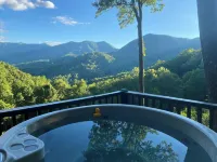 Enjoy the beautiful view of the mountains in your private hot tub!  Pet friendly - Wifi