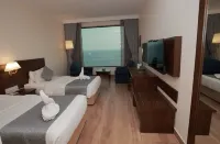The Quilon Beach Hotel and Convention Center فنادق في كولام