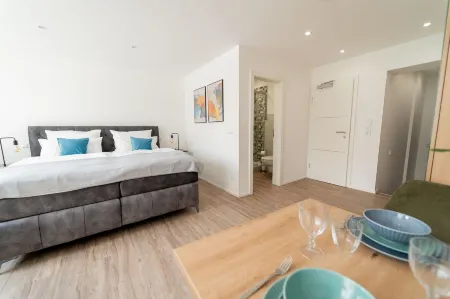 Apartments am Marktplatz Отели в г. Мюнзинген