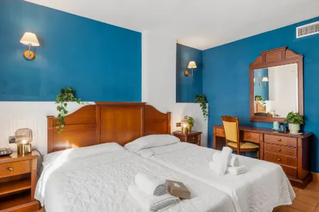 I am la Posada Hotel and Apartment Отели рядом с достопримечательностью «Памятник Коломаресу»