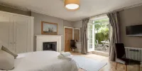 Joivy Boutique Apt with Patio in New Town - One-Bedroom Apartment