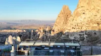 Caldera Cave Hotel & Restaurant - bar