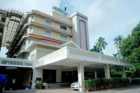 Krishna Inn Hotels near Machamangalath Bhagawathi Temple