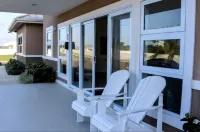 Cozy yet elegant Jamaican vacation home with access to pool, beach, gym etc