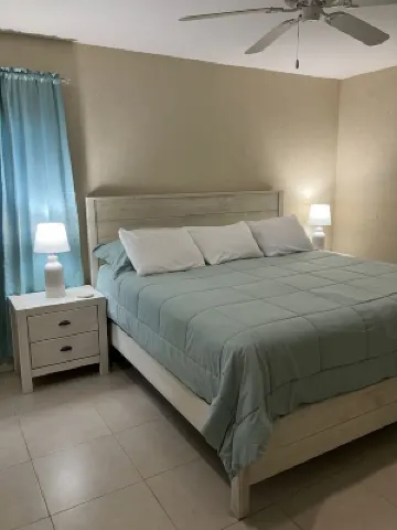 The Harvey Nicole: Modern Caribbean Ocean Front Condo Grand Cayman.