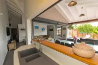 Treat yourself to a dream vacation at villa "Ciel de kaz Hotels in Petit-Bourg