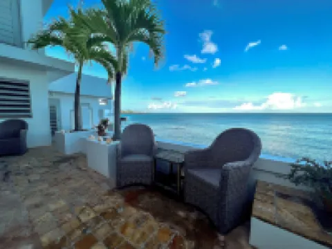 Stunning waterfront, art deco family compound cascading to the water’s edge