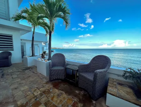 Stunning waterfront, art deco family compound cascading to the water’s edge