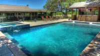 6-bedroom Lodge on 12 acres in Concan, Texas.  Swimming pool & hot tub.