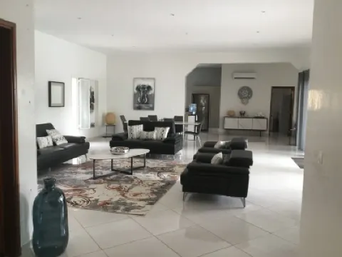 Modern villa of 250 m2 with private swimming pool, in secure residence Hotels in 