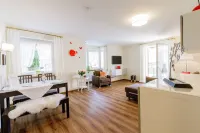 Bright, quiet and modern apartments with a large garden right in the center