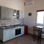 Dimore del Carrubo - open space with swimming pool