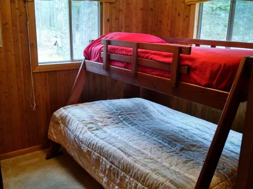 Island Getaway! Nestled in the woods with easy access to sandy beach
