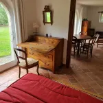 Apartment on the ground floor of a superb farmhouse in a landscaped park. You will be there alone