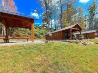 Cozy Riverfront cabin with hot tub!