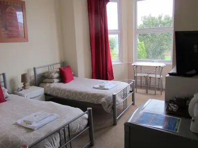 Donnington Guesthouse Отели в г. 