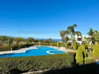 E1-2 Pine Valley Poolside Apartment Hotels in Charkeia