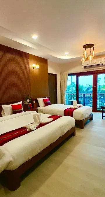 ห้องดีลักซ์สำหรับสามท่านพร้อมวิวสวน