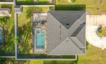 Modern 4BR Retreat Near Beach Heated Pool
