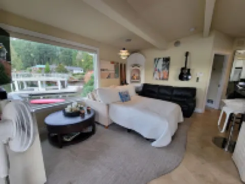 Unique Lake Goodwin Waterfront Cabin with Private Hot Tub and Boat Moorage