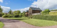 Chambres d'Hôtes et Suites à la Ferme de l'Oudon & Spa - บีแอนด์บี