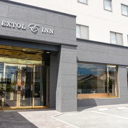 EXTOL INN Takamatsu Interchange Отели рядом с достопримечательностью «Выставочный центр Sun Messe Kagawa»