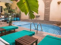 Amani Hotel Suites & Spa Hotels near Hivernage