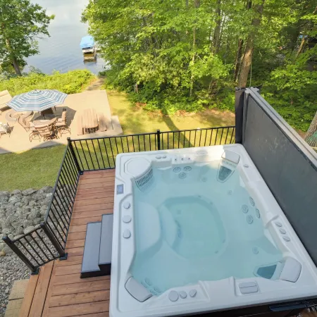 Cozy Benoit Lake Cabin w/ Hot Tub & Views