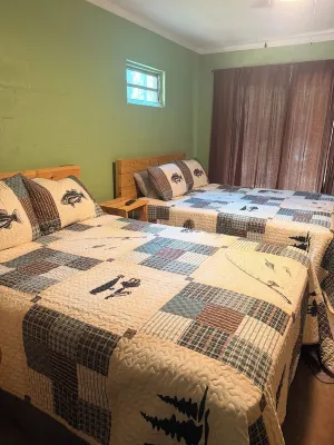 Two Story House with Deck over the River - Homestays