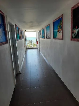 Apartahotel Isabelita Отели рядом с достопримечательностью «Маяк Колумба»