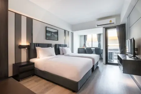 12 The Residence Hotel (Don Mueang Airport) Отели рядом с достопримечательностью «Phranakhon Rajabhat University»