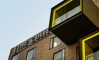 "a modern building with a sign that reads "" the cuile "" on the side of the building" at The Cullen Melbourne - Art Series