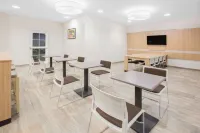 誇烏特莫克坎波門諾温德姆麥客達套房酒店 - 早餐