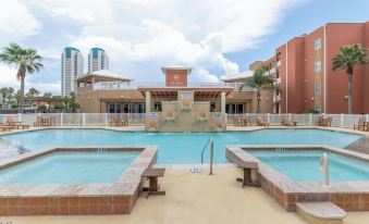 Casual Condo Near Beach w/ Pools, Hot Tub & Grill!