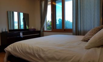 Jeju Dongmunbyeoljang Pension