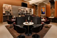 Sandal Suites by Lemon Tree Hotels - bar