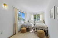 Beautiful 5 bedroom home just steps from the beach