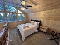 Modern Cabin w/ Hot Tub, Swings, Fire Pit, & Kayaks